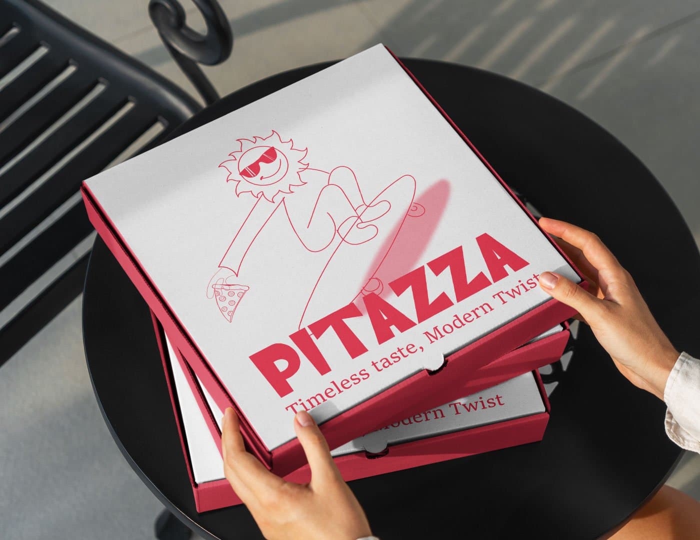 PITAZZA pizza box packaging mockup featuring bold typography, playful mascot illustration, and red branding