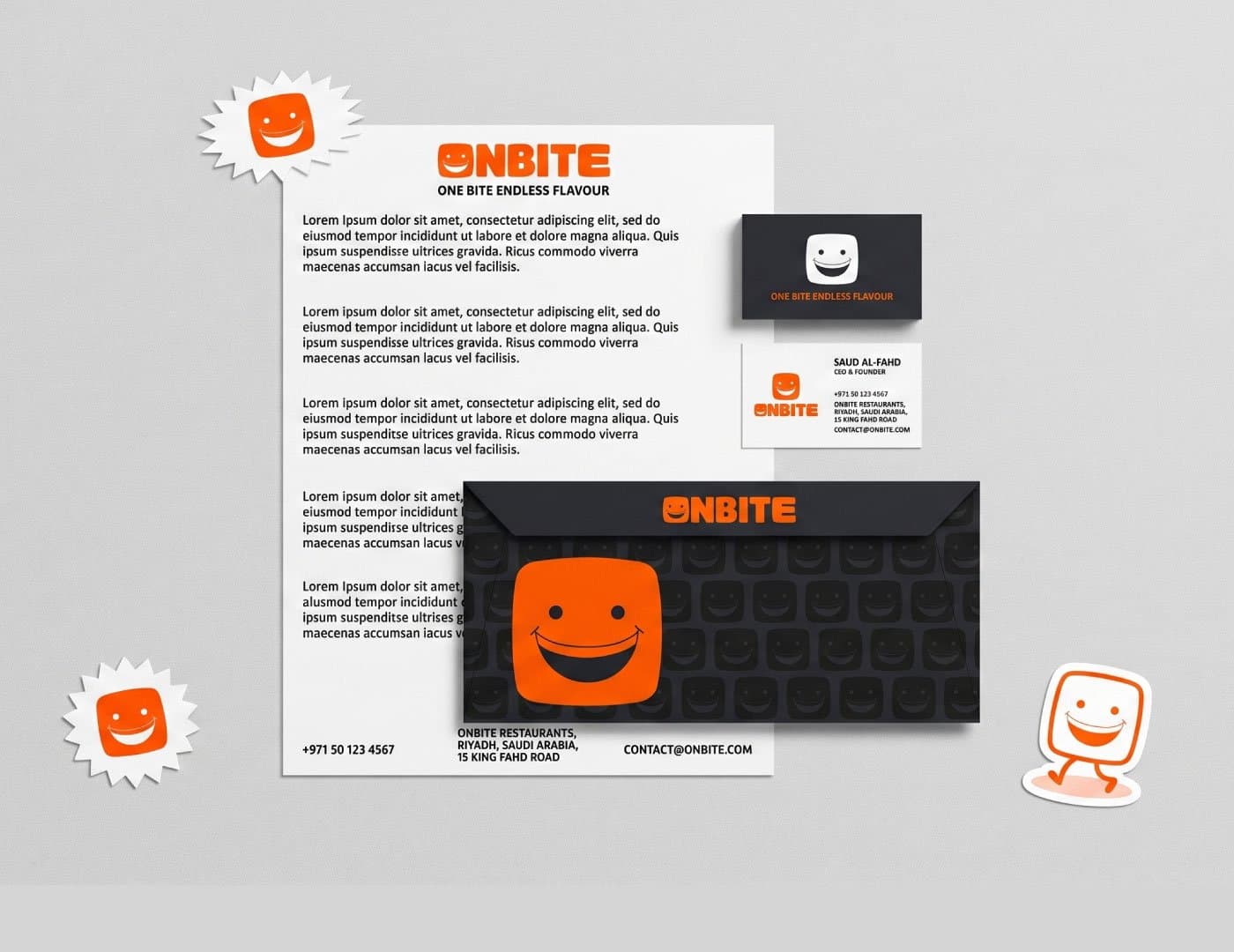 OnBite brand stationery mockup featuring branded letterhead, business cards, envelope design, and orange visual identity